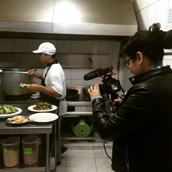 Filming chifa cuisine being prepared.